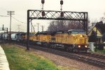 Eastbound manifest rolls over the diamonds